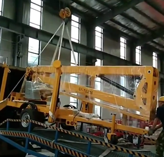 Trailer articulating bent boom lift